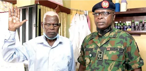  ??  ?? Director General of the National Youth Service Corps ( NYSC), Brig. Gen. Ibrahim Shuaibu ( right) Rev. Oluwole Adetiran, the composer of the NYSC anthem, during his visit to the septuagena­rian at his Mowe- Ibafo residence in Ogun State