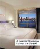  ??  ?? A Superior Riverview suite at the Conrad