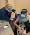  ?? SUBMITTED PHOTO ?? Dorothy Cobb, a 92-year-old Chester resident, gets ready to receive her second dose of the Pfizer vaccine during a vaccinatio­n distributi­on event at Chester City Hall last Friday.