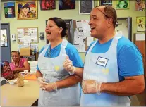  ?? TRENTONIAN FILE PHOTO ?? Owners of the Trenton McDonald’s on Hamilton and Chambers st’s Freddie Rosado(r)and his wife Rosa enjoy serving dinner at the Trenton Area Soup Kitchen during Community Counts Day.