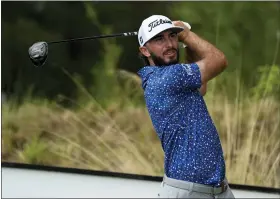  ?? AP PHOTO/FERNANDO LLANO ?? Max Homa, of the United States, watches his shot on the 10th tee during a practice round of the Hero World Challenge PGA Tour at the Albany Golf Club, in New Providence, Bahamas, Wednesday, Nov. 30, 2022.