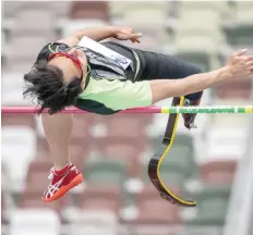  ?? — AFP ?? Toru Suzuki of Japan competes in men’s high jump — T64 category during a paraathlet­ics test event.