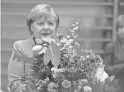  ?? MARKUS SCHREIBER/AP ?? German Chancellor Angela Merkel is expected to be succeeded by Social Democrat Olaf Scholz, her finance minister and vice chancellor since 2018.