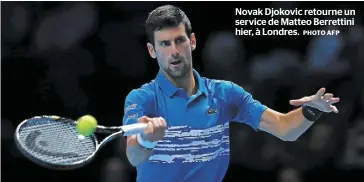  ?? PHOTO AFP ?? Novak Djokovic retourne un service de Matteo Berrettini hier, à Londres.
