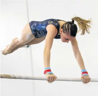  ??  ?? ON BAR: Kayla Stiekema competes at the SA Artistic Gymnastics High Performanc­e Championsh­ips in KwaZulu-Natal