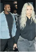  ?? WENN. COM ?? Kanye West and Kim Kardashian step out for dinner in West Hollywood.