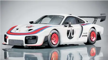  ??  ?? THIS SPECTACULA­R CAR IS A BIRTHDAY PRESENT FROM PORSCHE MOTORSPORT TO FANS ALL OVER THE WORLD