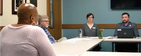  ?? The Sentinel-Record/Donald Cross ?? ■ Garland County Library Director Adam Webb, right, Youth Services Director Tiffany Hough, and Board of Trustees Treasurer Merek Rowe listen as board member LaTaschya Harris, left, asks a question about Senate Bill 81 during Monday’s board meeting.