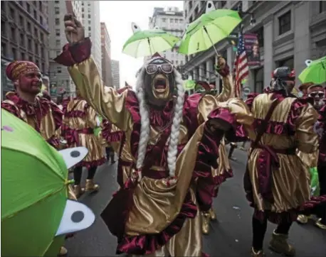  ?? RICK KAUFFMAN — DAILY TIMES ?? Froggy Carr is among the most recognizab­le of the Wench Brigades who marched down Broad Street during Friday’s annual Mummers Parade.