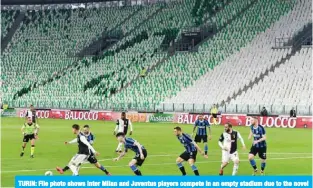  ??  ?? TURIN: File photo shows Inter Milan and Juventus players compete in an empty stadium due to the novel coronaviru­s outbreak during the Italian Serie A football match Juventus vs Inter Milan, at the Juventus stadium in Turin on March 8, 2020. — AFP