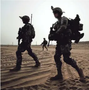  ??  ?? Members of Vermont National Guard’s Delta Company, 3rd Platoon, leave the safety of an Afghan Combat Outpost near the village of Rahman Keyhl in southern Paktia Province on Sept. 15, 2010. RYAN MERCER/FREE PRESS