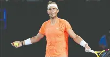  ?? LOREN ELLIOTT/REUTERS ?? No. 2 seed Rafael Nadal exchanges words with a heckler during his victory on Thursday at the Australian Open.