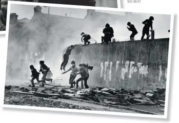  ??  ?? Catholic youth escaping a CS gas assault in the Bogside, Londonderr­y, Northern Ireland, 1971.