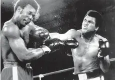 ?? FOTO: IMAGO ?? Von Muhammad Ali bezwungen: George Foreman (links) 1974 in der Hitze von Kinshasa.