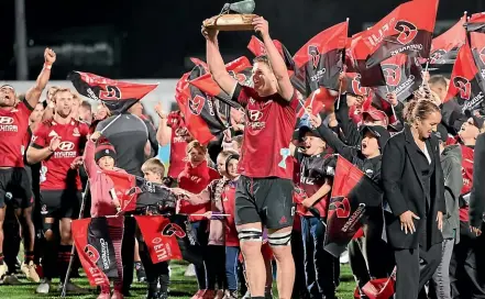  ?? PETER MEECHAM/GETTY IMAGES ?? Scott Barrett of the Crusaders with the trophy after winning the Super Rugby Aotearoa Final match against the Chiefs.