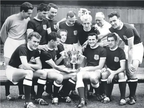  ??  ?? 0 Bobby Wishart, fourth from the left in the back row, has his eyes on the prize after Dundee's league championsh­ip win in 1962