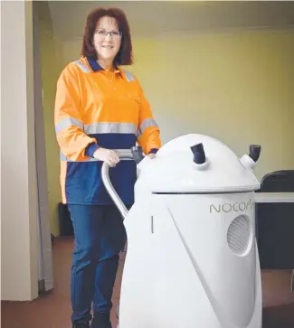  ?? Picture: Bev Lacey ?? CLEANING UP: Ability Enterprise­s’ Sue White shows off their new cleaning machine that can disinfect areas of up to 20,000 cubic metres.