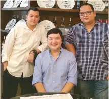  ??  ?? C’ Italian Dining owners Rey and Ed Pineda and Paolo Tolentino.