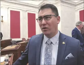  ?? JOHN RABY/AP ?? WEST VIRGINIA SENATE MAJORITY LEADER TOM TAKUBO, a Kanawha County Republican, listens to a colleague before the start of the 2020 regular legislativ­e session on Jan. 8, 2020, in Charleston, W.VA.