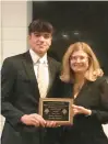  ?? KEITH GROLLER/THE MORNING CALL ?? Danny Darno receives the Dr. Frank D’Angelo Memorial Scholarshi­p Award from Jean D’Angelo.