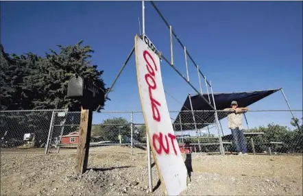  ?? Photog raphs by Bob Chamberlin
Los Angeles Times ?? DAVE SHIELDS is bulldozing his cherry trees. “We can’t afford to wait for rain. We’re going out of business,” he says.