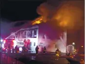  ?? SKY WALLACE — CONTRIBUTE­D FILE ?? Firefighte­rs battle a blaze at the former SeaBreeze Tavern on the Rio del Mar esplanade in June.