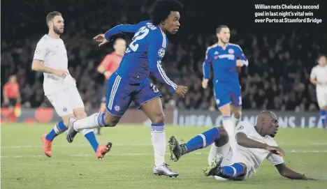  ??  ?? Willian nets Chelsea’s second goal in last night’s vital win over Porto at Stamford Bridge