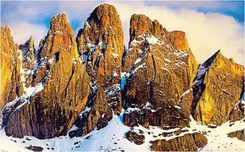  ?? ?? IMPRESSIVE: The Dolomites in Italy. Bottom: St Anthony’s church