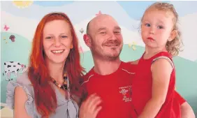  ??  ?? This picture of Daniel Holmes, wife Marzena and eldest daughter Rainbow was taken in the ‘family’ visiting room in the prison in Malta