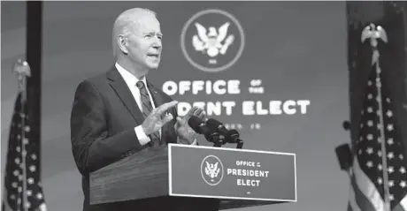  ?? ALEX WONG/GETTY ?? President-elect Joe Biden speaks Friday about fighting the coronaviru­s pandemic that’s ravaged the U.S.