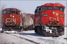  ?? CP PHOTO RYAN REMIORZ ?? Canadian National is apologizin­g for failing to keep grain shipments moving reliably by rail, and says it’s taking immediate steps to clear the backlog including mobilizing more train cars and workers.