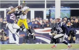  ?? ELISE AMENDOLA/AP ?? New England Patriots cornerback Malcolm Butler (21) breaks up a pass intended for Pittsburgh Steelers wide receiver Antonio Brown during the AFC Championsh­ip game.