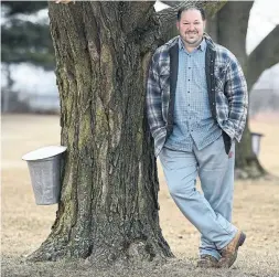  ?? JASON LIEBREGTS/METROLAND ?? Oshawa resident Eric Girard is an avid maple-syrup hobbyist and banker by trade. He currently has more than 500 trees tapped for the current season.