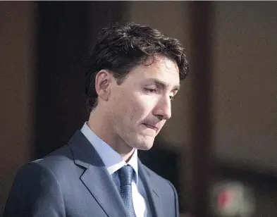  ?? CHRIS YOUNG / THE CANADIAN PRESS ?? Prime Minister Justin Trudeau faces questions from reporters at the Ontario Legislatur­e in Toronto on Thursday.