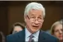  ?? ALEX BRANDON - THE ASSOCIATED PRESS ?? Jamie Dimon, chairman and CEO of JPMorgan Chase & Co., during a Senate Banking, Housing, and Urban Affairs Committee oversight hearing to examine Wall Street firms on Dec. 6. Dimon is the nation’s most influentia­l banker.