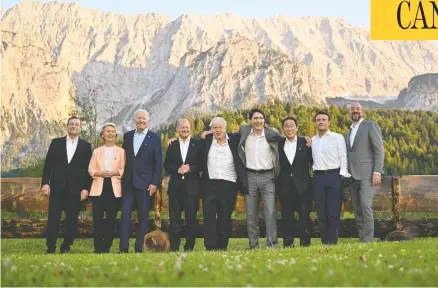  ?? THOMAS LOHNES / GETTY IMAGES ?? Leaders gather for a photo on the first day of the G7 summit at Schloss Elmau, Germany, on Sunday. From left, Italy's Prime Minister Mario Draghi, European Commission President Ursula von der Leyen, U.S. President Joe Biden, Germany's Chancellor Olaf Scholz, Britain's PM Boris Johnson, PM Justin Trudeau, Japanese PM Fumio Kishida, France's President Emmanuel Macron and European Council President Charles Michel.