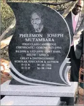  ??  ?? AUTHOR: Professor Arthur Mutambara standing behind his father’s tombstone at the unveiling ceremony.