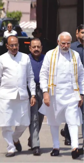  ??  ?? Prime Minister Narendra Modi arrives at Parliament House ahead of the monsoon session in New Delhi yesterday.