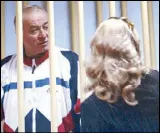  ?? AP ?? Photo taken on Aug. 9, 2006 shows Sergei Skripal speaking to his lawyer outside a courtroom in Moscow.