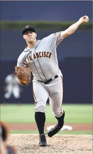  ?? DENIS POROY — GETTY IMAGES ?? Giants pitcher Ty Blach fires a strike during the first inning of their game against the San Diego Padres at PETCO Park on Wednesday night. Blach pitched well despite allowing two Padres home runs.