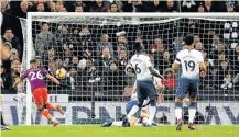  ?? Picture: REUTERS/PAUL CHILDS ?? SPOT ON: Manchester City’s Riyad Mahrez scores his team’s first, and only goal as City beat Tottenham Hotspurs on Monday.