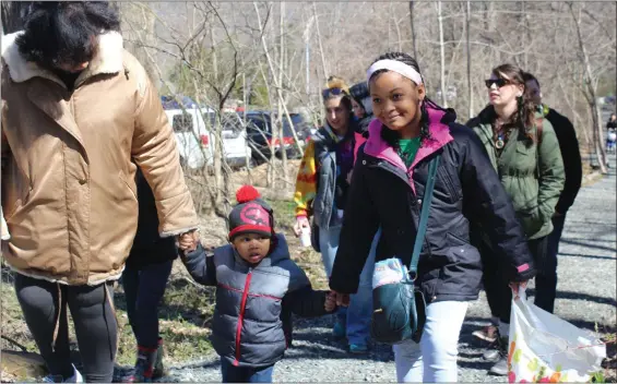  ?? MEDIANEWS GROUP FILE PHOTO ?? A family walks along the trail at the Althouse Arboretum in Upper Pottsgrove. Walking briskly is a heart healthy activity and can also help the environmen­t when used as a form of transporta­tion.