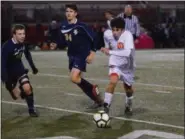  ?? AUSTIN HERTZOG - DIGITAL FIRST MEDIA ?? Perkiomen Valley’s Brian Love (10) carries the ball forward as Spring-Ford’s Ethan Mossip chases him down.