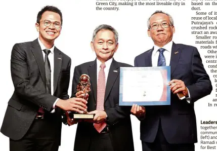  ??  ?? Leaders in their field: Azlan (centre) together with section head corporate communicat­ions Mohd Hafiz Abdul Ghani (left) and senior general manager Hassan Ramadi receiving the European Awards for Best Practices 2018 in Brussels.