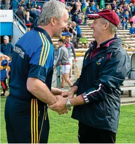  ?? SPORTSFILE ?? Opportunit­y knocks: Westmeath boss Michael Ryan (right) with his Tipperary namesake at Semple Stadium in July