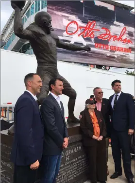  ?? JEFF SCHUDEL — THE NEWS-HERALD ?? Members of Otto Graham’s family join Browns general manger John Dorsey, second from right, on Sept. 7at FirstEnerg­y Stadium.