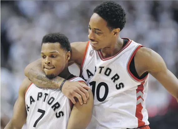  ?? FRANK GUNN/THE CANADIAN PRESS/FILES ?? Kyle Lowry, left, and DeMar DeRozan will once again be counted on to lead a Raptors franchise hoping to take the next step in the post-season.