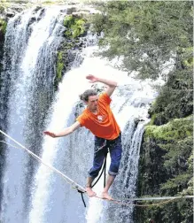  ?? PHOTO: NZME ?? Don’t look down . . . Frenchman Julien Schilling crosses Whangarei Falls at the weekend.