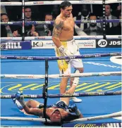  ?? Picture: GETTY IMAGES/NATHAN STIRK ?? OUT FOR THE COUNT: Ukraine’s Oleksandr Usyk knocks out England’s Tony Bellew during their WBC, WBA, WBO, IBF &amp; Ring Magazine world cruiserwei­ght title fight at Manchester Arena in England on Saturday.