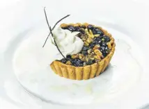  ??  ?? Endive, pear, blue cheese and candied walnut salad, main; Ecclefecha­n tart with crème Chantilly, above